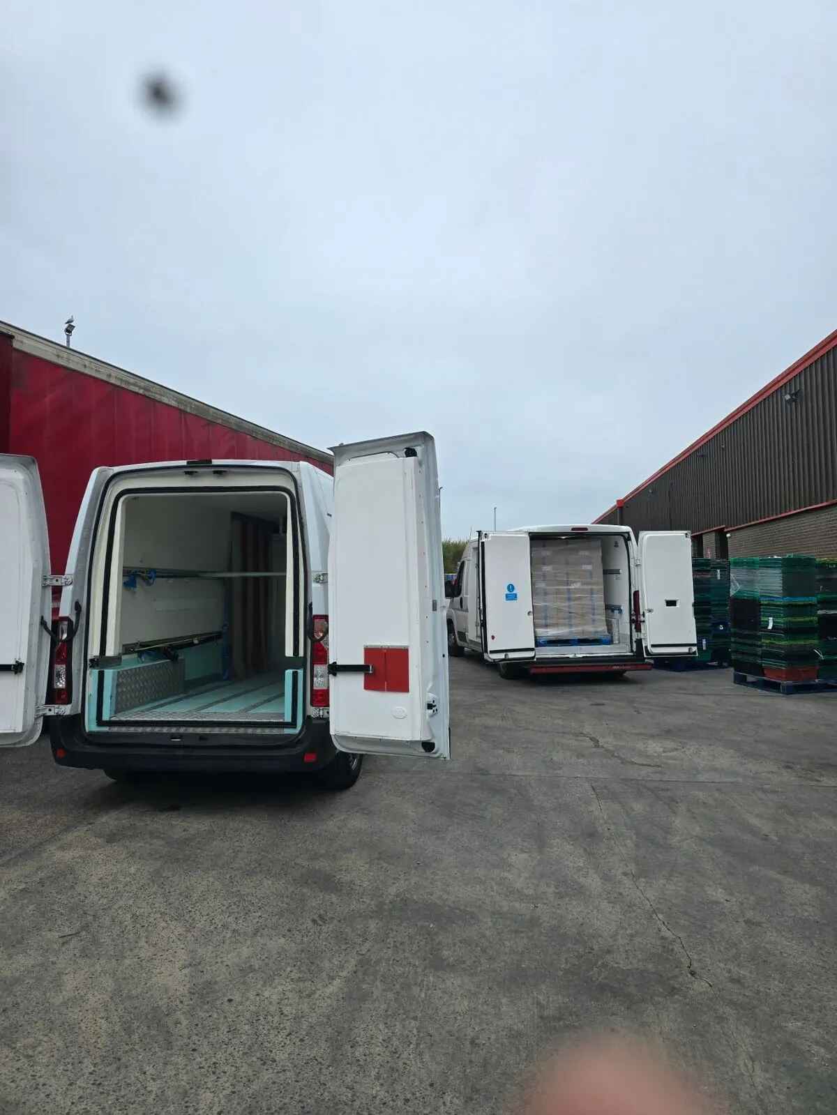 Europa Xpress temperature-controlled courier vans at distribution depot
